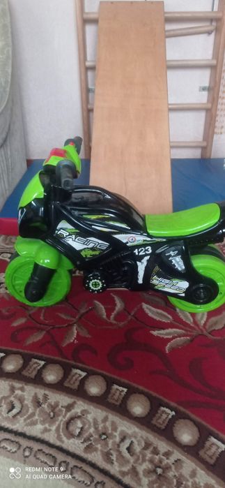 Музыкальный мотоцикл каталка,
5774