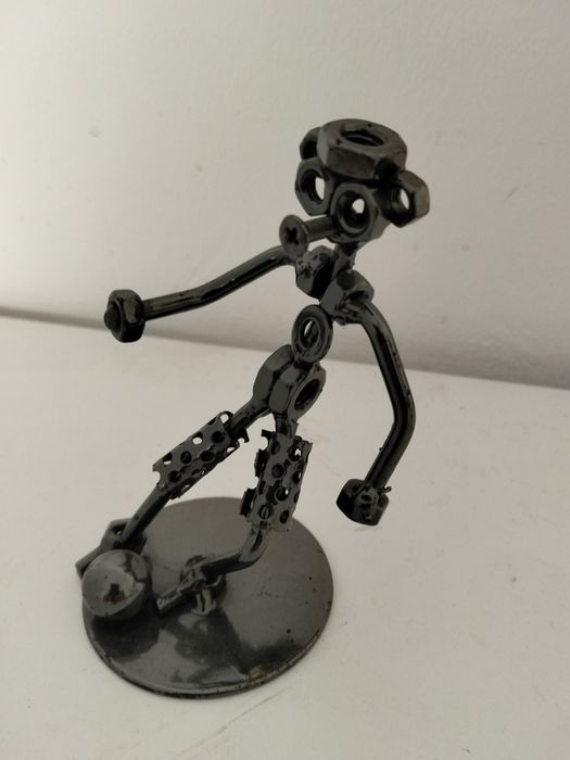 Moto, músico e futebolista, estatuetas em metal
