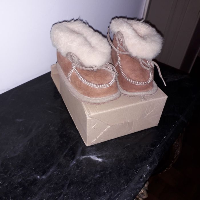 Pequenas pantufas para bébé ou para decoracao