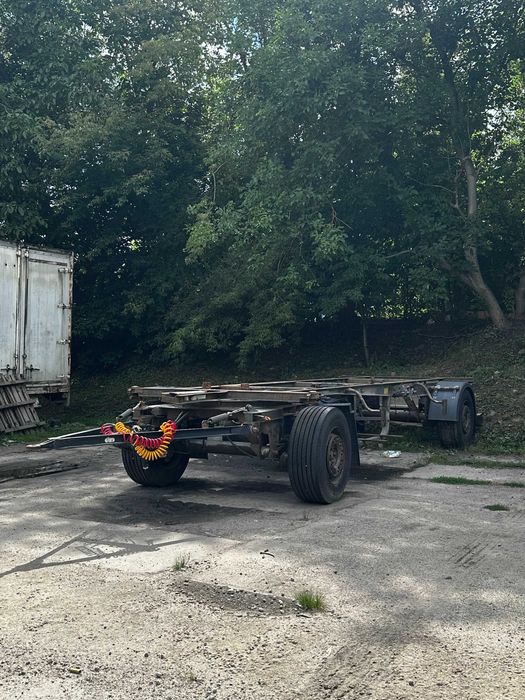 причіп контейнеровоз на кругу SCHMITZ CARGOBULL