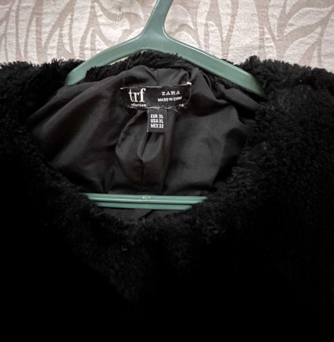 Casaco de pelo preto