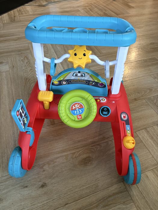 Jezdzik chodzik fisher price pchacz malego kierowcy auto