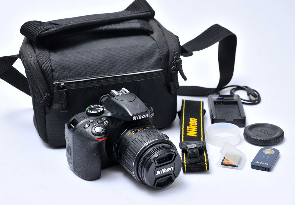 Nikon D3300 C/ lente 18-55mm (excelente estado)