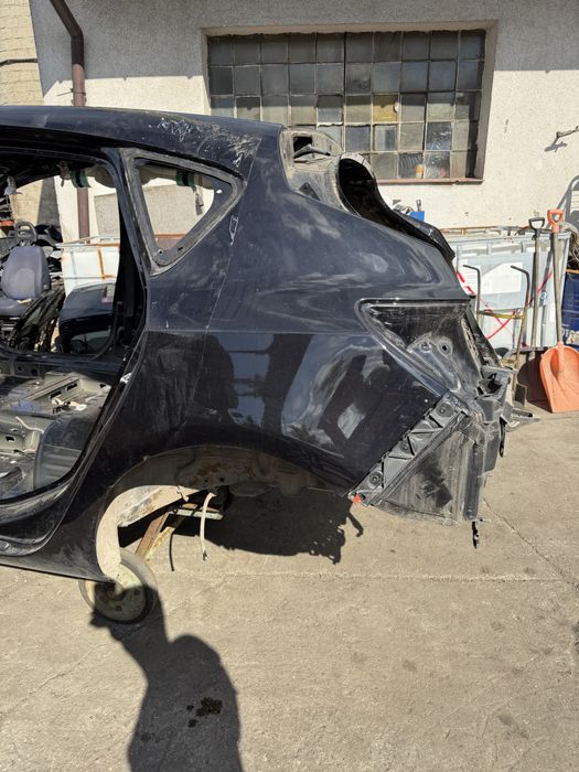 Błotnik tył lewy Opel Astra J hatchback ćwiartka tylna Astra IV