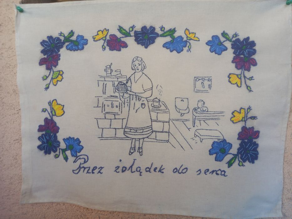 Makatka ścienna ręcznie haftowana nowa.Przez żołądek do serca.