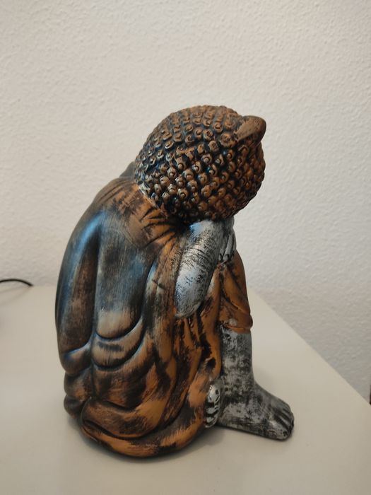 Buda em prata e dourado