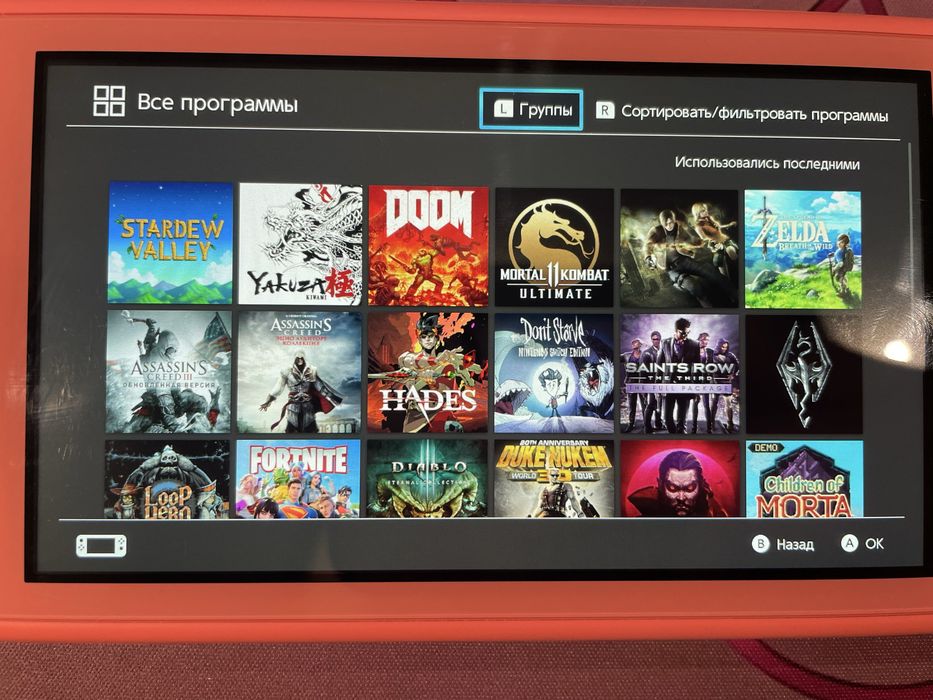 Nintendo Switch Lite рожевий + багато ігор
