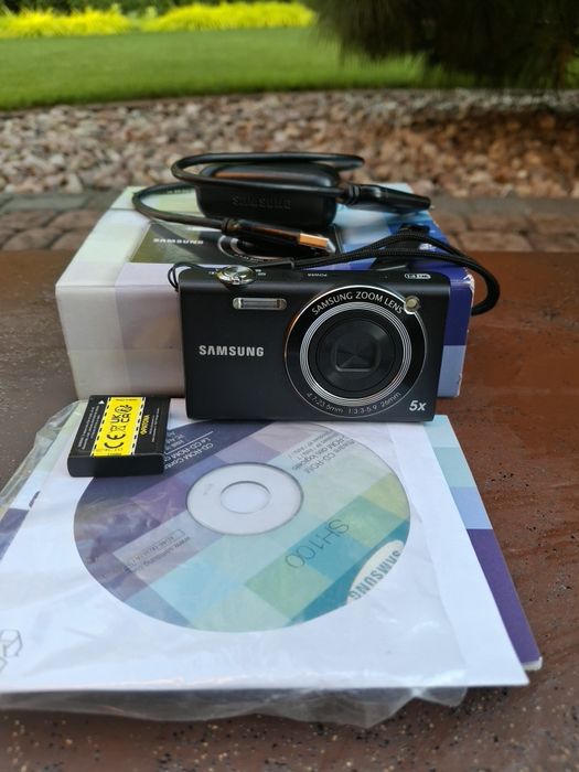 Aparat Samsung SH100 – Kompaktowy, Wi-Fi. Z kartonikiem i ładowarka