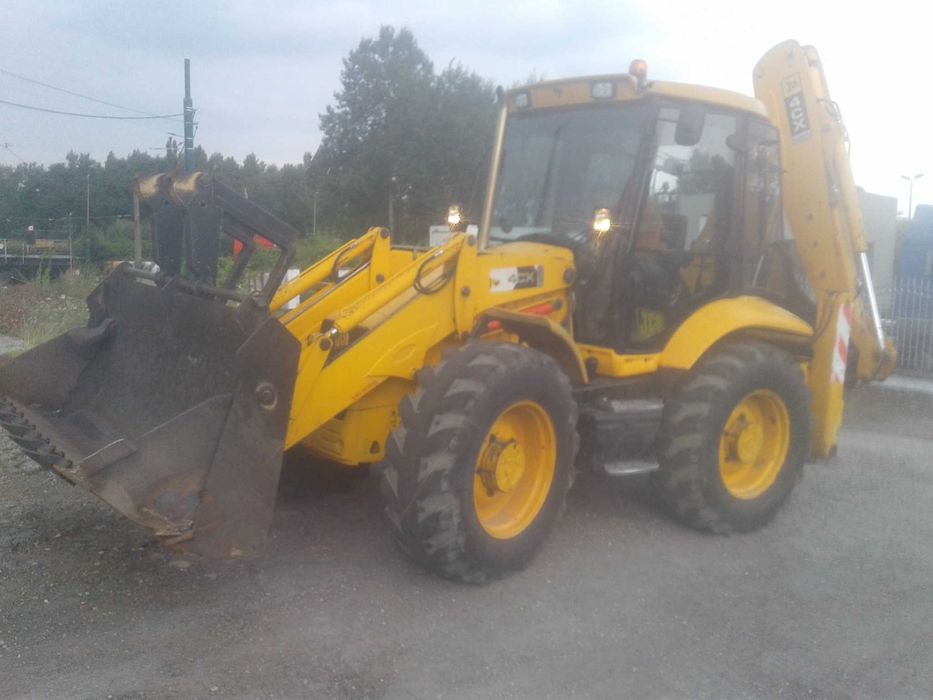 usługi koparkami koparką koparko-ładowarką koparka prace ziemne wykopy