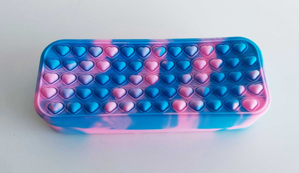 Estojo com bolhas sensoriais pop it do Stitch