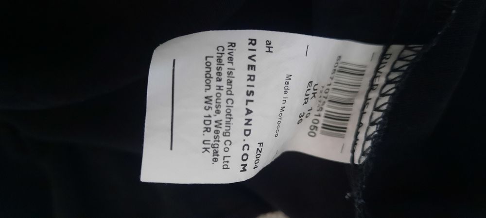 Śliczna bluzka z falbanką-River Island