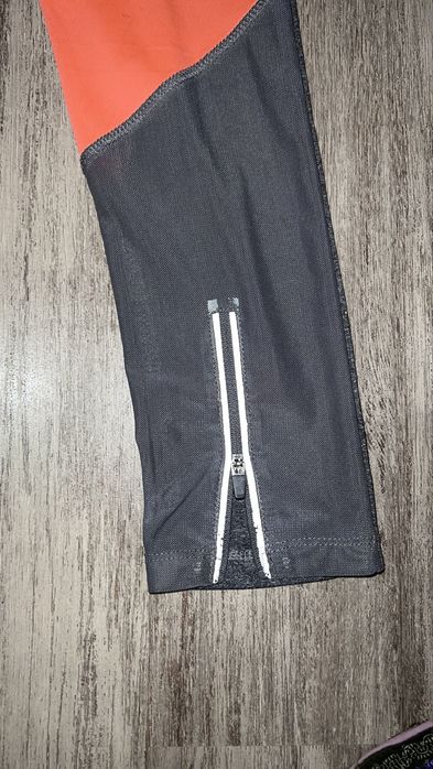 Legginsy do biegania M 38 Damski odblaski kieszonka