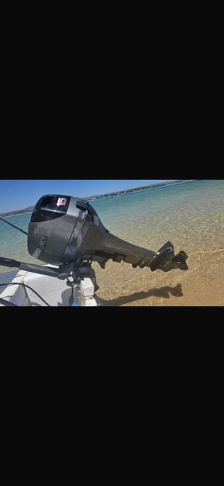 Barco com motor suzuki 15cv