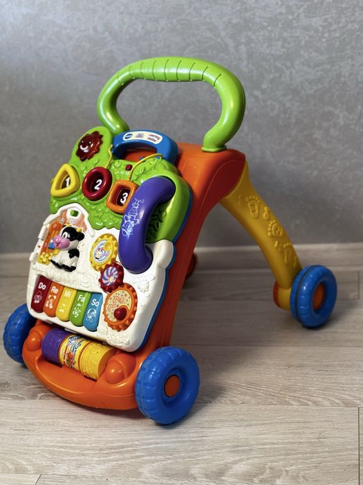 Ходунки штовхач з інтерактивною ігровою панеллю