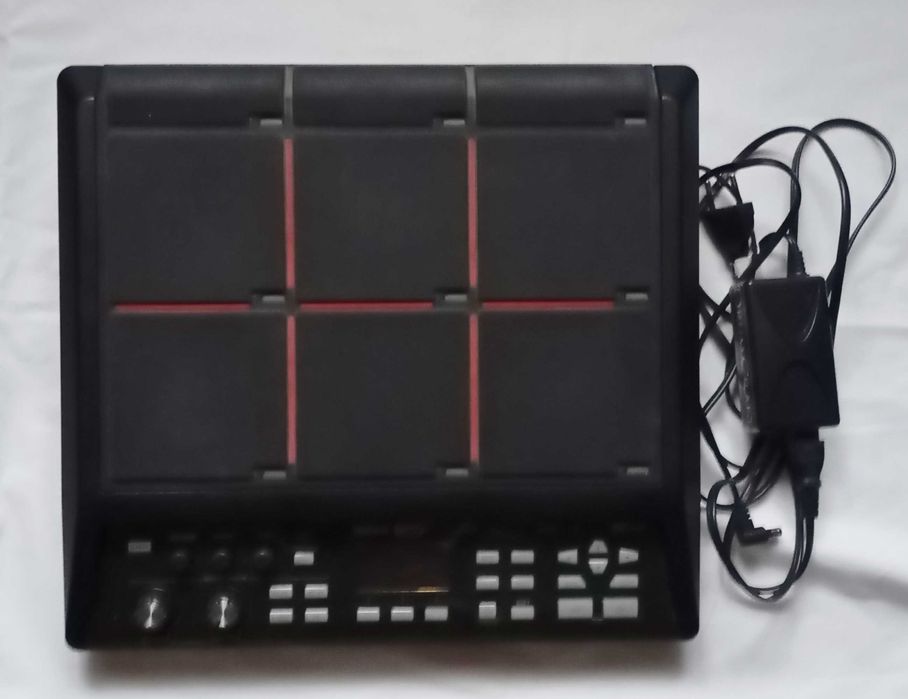 Електронні перкусійні семплери SPD-SX та тригери Roland