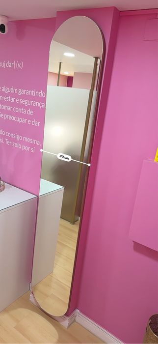 Espelho coluna com bordas ovais