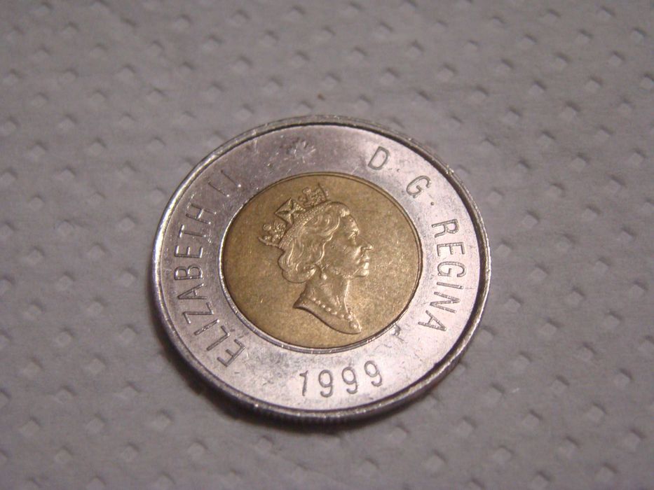 Продам колекційну монету 2 канадських долари НАНАВУТ  1999 р