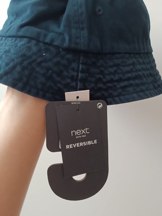 Kapelusz dwustronny typu bucket Next