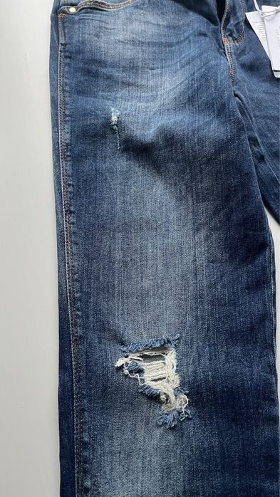 Guess niebieskie jeansy z dziurami W81AJ2D2ZI0 25 L30