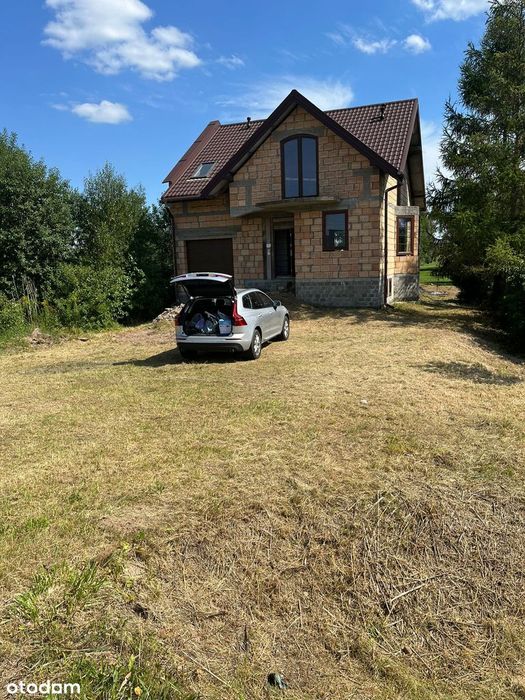 Dom parterowy z poddaszem użytkowym,podpiwniczony,st. surowy zamknięty