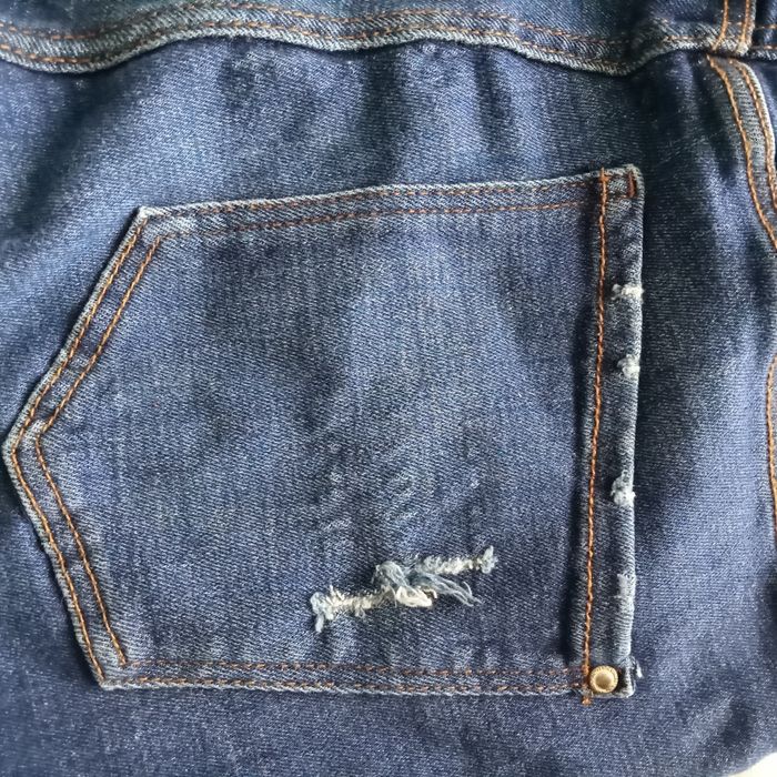 Jeansy damskie ze streczem i przetarciami Zara 40