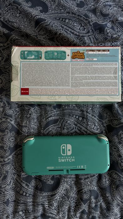 Consola Nintendo Switch lite turquesa com mala