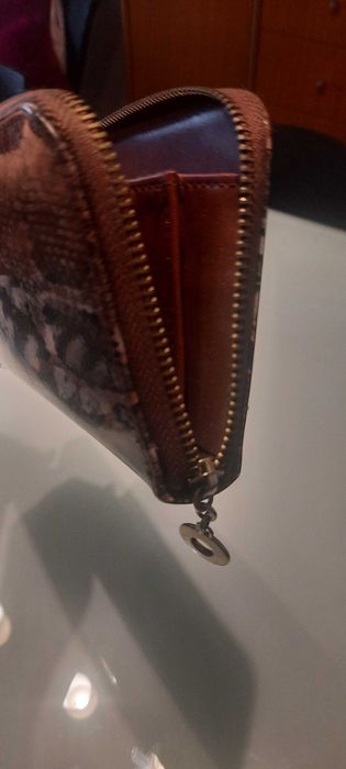 Porta moedas como novo