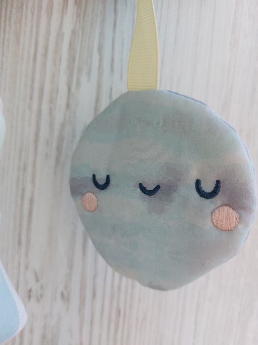 Іграшка на автокрісло коляску