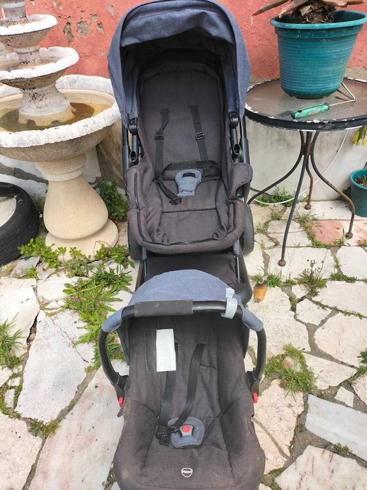 Carrinho de bebe com ovo e malinha