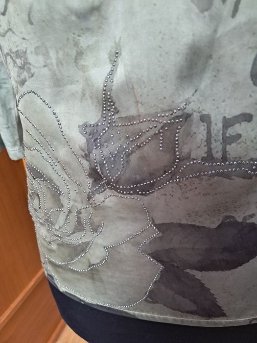 Letnia wyprzedaż. Damska bluzka firmy Allesa W Collection.