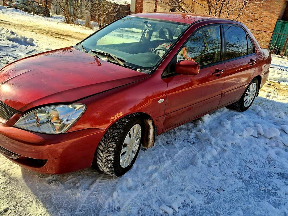 Мицубиси лансер.