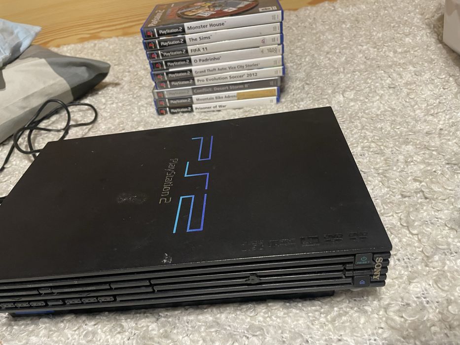 Mega drive ll com caixa original e comando/ ps2 com comando avariado e jogos