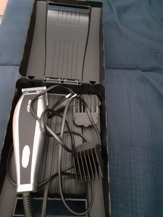 Máquina de cortar cabelo eléctrica