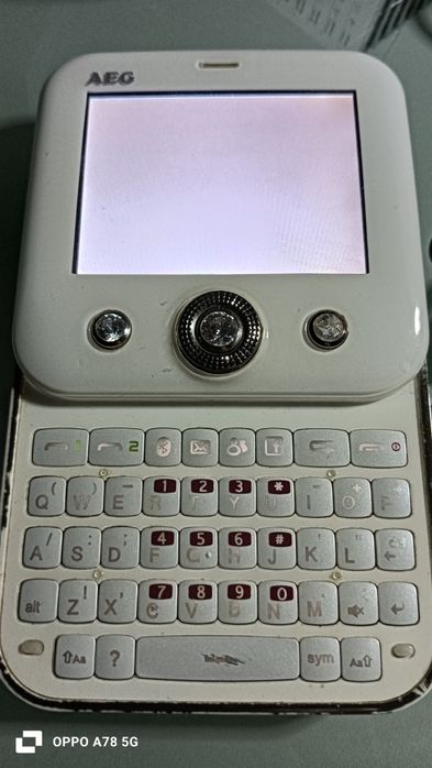 Telemóvel AEG c/carregadores e fones