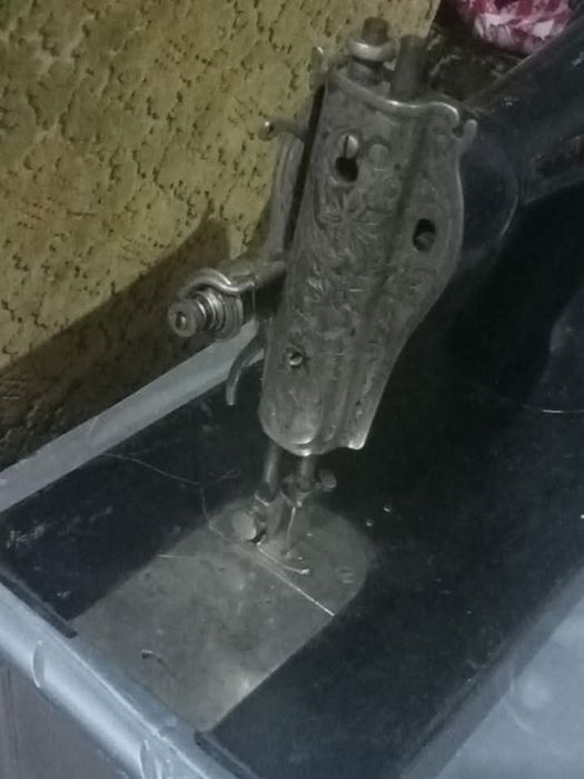 Cabeça de máquina Singer antiga