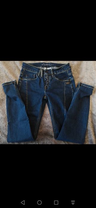 Jeansy z rozcięciami S