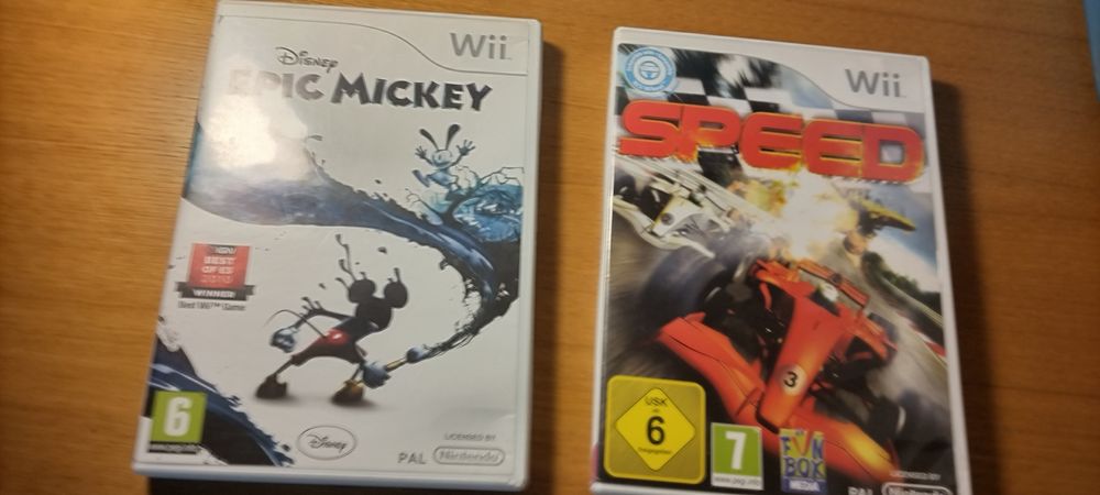 2 jogos da Wii do mickey e das corridas