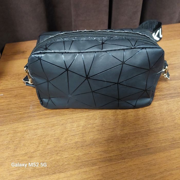 Маленька жіноча сумочка