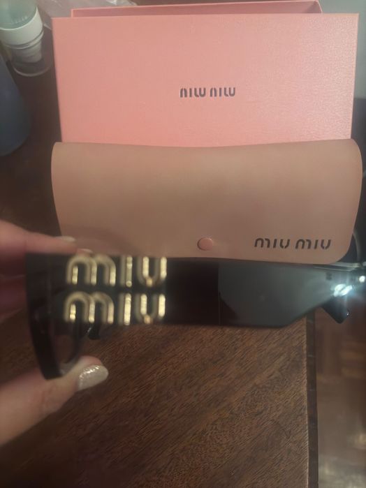 Óculos de sol miu miu