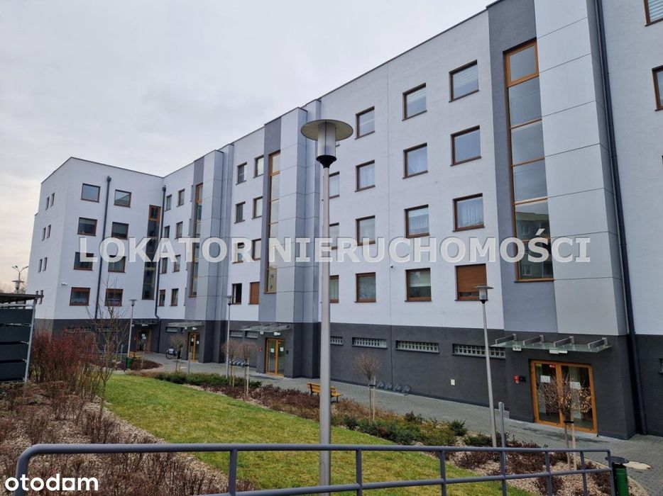 Apartament z tarasem + miejsce postojowe w hali