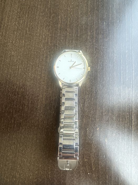 Relogio Radiant dourado e cinza