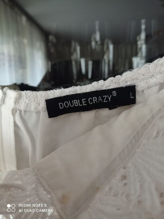 Piękna sukienka koronkowa L 40 biała