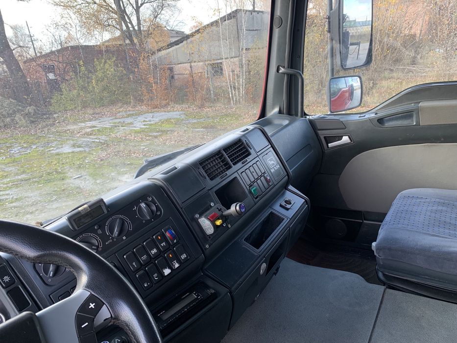 Ман самоскид з маніпулятором