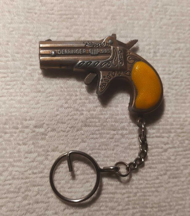 Brelok Derringer 995 podwójna lufa 6,5cm Zawieszka brąz - pomarańcz