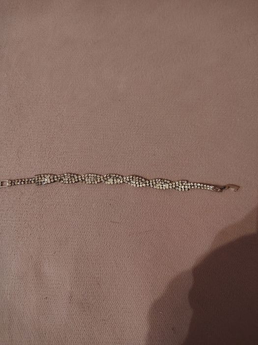 Branzoletką. Damska.