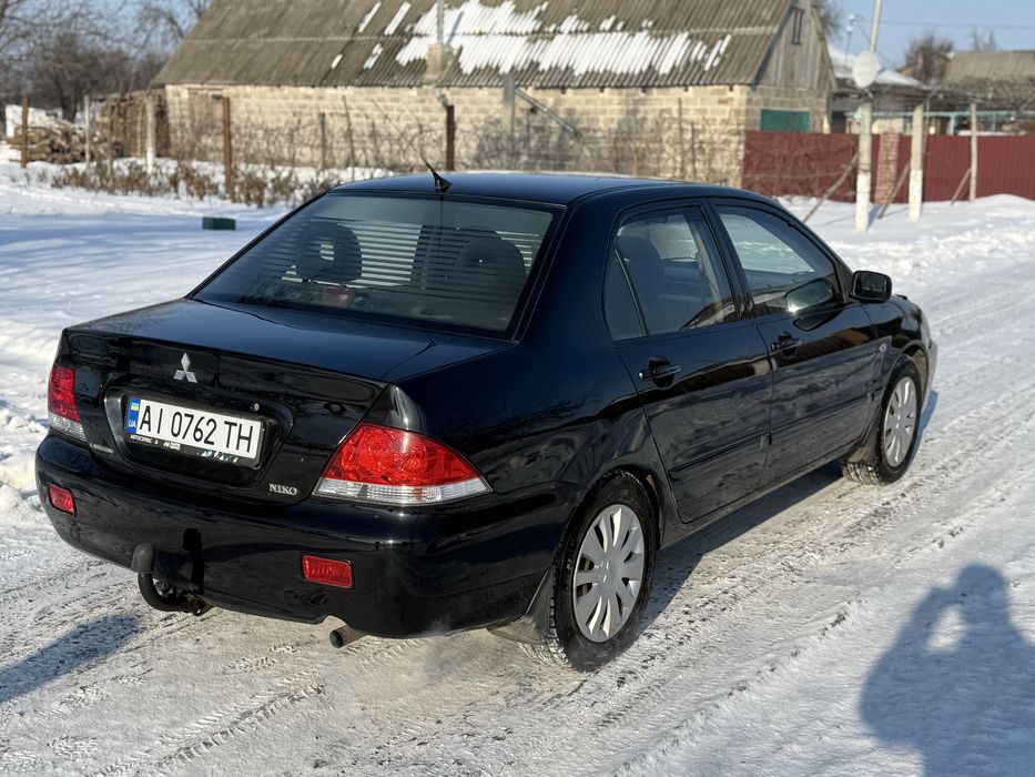 Продам  Mitsubishi Lancer