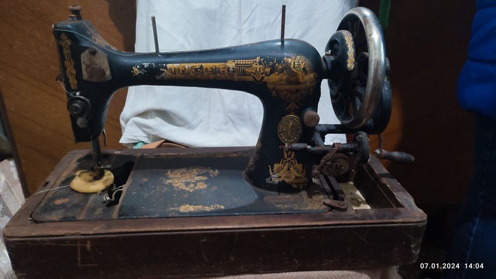 Ручна швейна машина Singer.