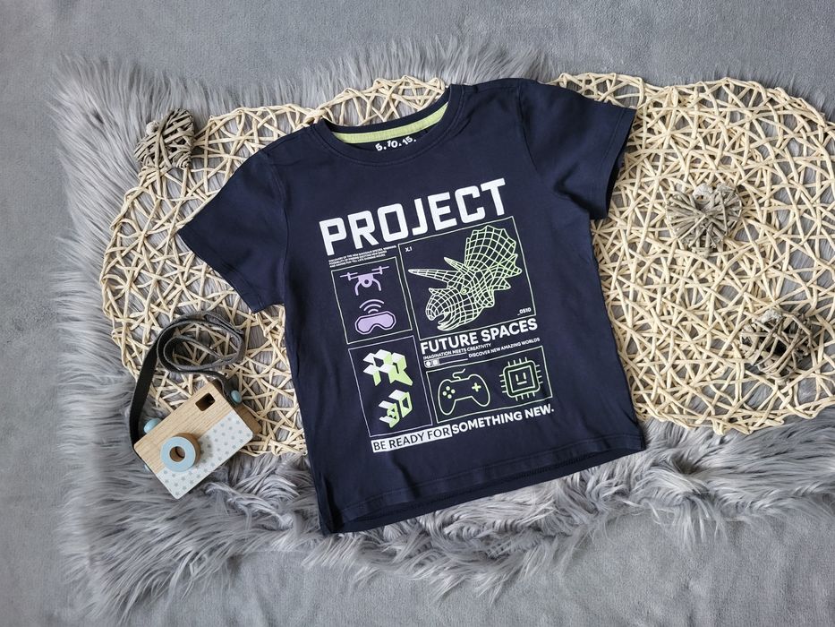T-shirt marki 5.10.15 z motywem dinozaurów w rozmiarze 116