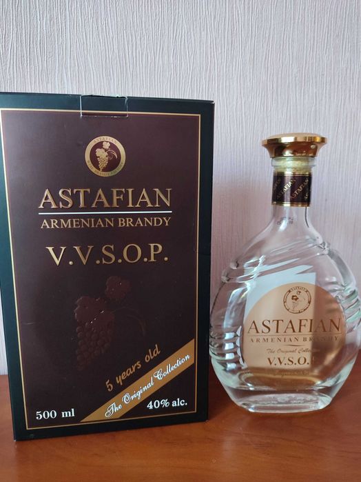 Бутилка з упаковкою декупаж