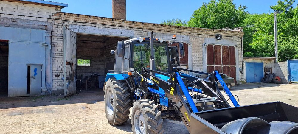 Быстросйомный фронтальный погрузчик кун Юмз